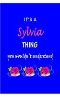 It's A Sylvia Thing You Wouldn't Understand: Sylvia First Name Personalized Journal 6x9 Notebook, Wide Ruled (Lined) blank pages Funny Cover for Girls and Women with Pink Name, Roses, on Blue