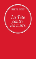La tête contre les murs