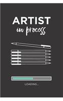 Artist in process composition notebook