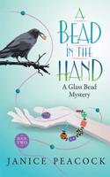 A BEAD IN THE HAND