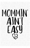 Mommin' Ain't Easy: A 6x9 Inch Matte Softcover Notebook Journal with 120 Blank Lined Pages and a Parenting Cover Slogan