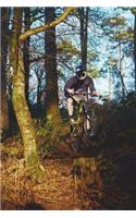 Mountain Biker in the Forest Journal: 150 Page Lined Notebook/Diary: 150 Page Lined Notebook/Diary