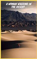 A woman walking on sand dunes.