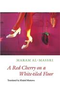 A Red Cherry on a White-tiled Floor