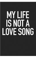 My Life Is Not a Love Song: A 6x9 Inch Matte Softcover Journal Notebook with 120 Blank Lined Pages and a Funny Unromantic Valentine Cover Slogan