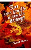 Sur Une Feuille d'Érable Rouge