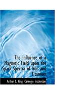 The Influence of a Magnetic Field Upon the Spark Spectra of Iron and Titanium