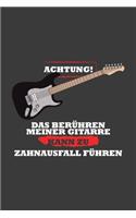Achtung! Das Berühren meiner Gitarre kann zu Zahnausfall führen