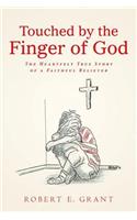 Touched by the Finger of God