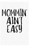 Mommin' Ain't Easy: A 6x9 Inch Matte Softcover Notebook Journal with 120 Blank Lined Pages and a Funny Parenting Cover Slogan