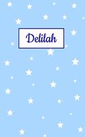 Delilah: Personalized Name Journal. Wide Ruled (Lined) Writing Diary, Composition Book. Baby Blue Star Cover for Girls, Kids and Teens