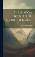 Shadow Between His Shoulder-Blades