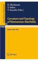 Curvature and Topology of Riemannian Manifolds