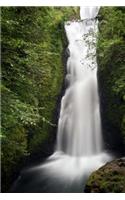 A Waterfall in the Mountains on a Summer Day Journal: 150 Page Lined Notebook/Diary