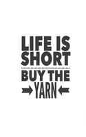 Life is Short, Buy the Yarn: Journal with 100 lined pages featuring a ball of yarn and crochet hook on each page.