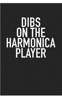 Dibs on the Harmonica Player