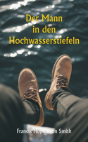 Mann in den Hochwasserstiefeln