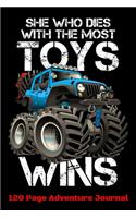 She Who Dies With The Most Toys Wins