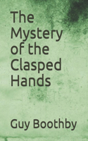 The Mystery of the Clasped Hands