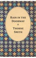 Rain in the Doorway