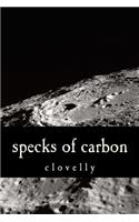 specks of carbon