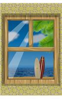 Windows on the ocean with surfboard