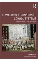 Towards Self-improving School Systems