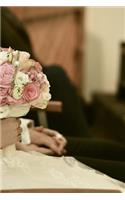 Bride Sitting and Holding the Bridal Bouquet Journal