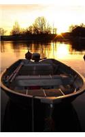 A Sunkissed Boat on a Golden Pond at Sunset Journal: 150 Page Lined Notebook/Diary