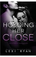 Holding Her Close