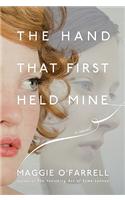The Hand That First Held Mine