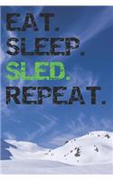 Eat Sleep Sled Repeat: Winter Sports Notebook College Ruled Lined