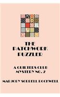 The Patchwork Puzzler (A Quilters Club Mystery No. 2)