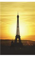 Sunrise Over the Eiffel Tower in Paris France Journal: 150 page lined notebook/diary