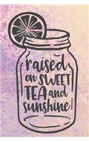 Raised On Sweet Tea And Sunshine: Cute Bottle With Lemon Design Notebook Journal Diary for everyone - purple, pinked background