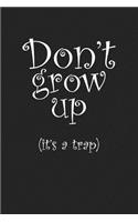 Don't Grow Up It's a Trap: A 6x9 Inch Matte Softcover Journal Notebook with 120 Blank Lined Pages and a Funny Parenting Cover Slogan