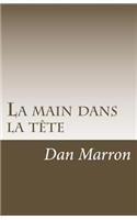 main dans la tête