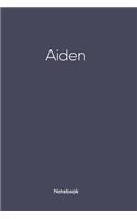 Notebook with Aiden on it