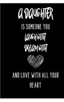 A daughter is someone you laugh with dream with and love with all your heart