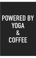 Powered by Yoga and Coffee: A 6x9 Inch Matte Softcover Journal Notebook with 120 Blank Lined Pages and a Funny Caffeine Loving Cover Slogan