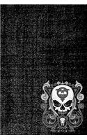 Curly skull notebook corner