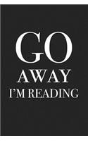 Go Away I'm Reading: A 6x9 Inch Matte Softcover Journal Notebook with 120 Blank Lined Pages and a Funny Book Lover Cover Slogan