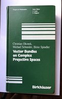 Vector Bundles on Complex Projective Spaces