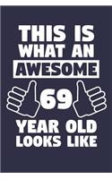 Blank Lined Journal, Notebook, Diary, Planner - This Is What An Awesome 69 Year Old Looks Like - 69th Birthday Gift: Medium College-Ruled Journey Diary, 110 page, Lined, 6x9 (15.2 x 22.9 cm)