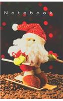 Notebook: Skiing Santa Claus - 5.06x7.81 (12.85x19.84cm) Journal/Diary/Lists.