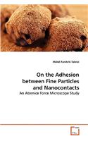 On the Adhesion between Fine Particles and Nanocontacts
