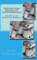 Papa und Sohn basteln mit Klopapierrollen
