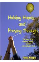 Holding Hands and Praying Through
