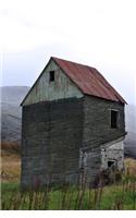 A Solitary Abandoned House in a Mountain Valley in Iceland Journal