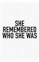 She Remembered Who She Was...: A 6x9 Inch Matte Softcover Journal Notebook with 120 Blank Lined Pages and an Uplifting Positive and Motivaitonal Cover Slogan